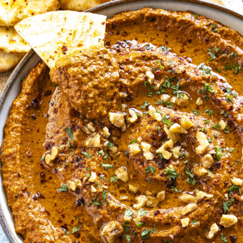 Muhammara Dip in a bowl with pita