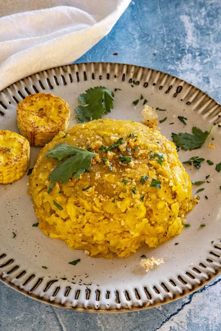 Mofongo on a plate with garnish