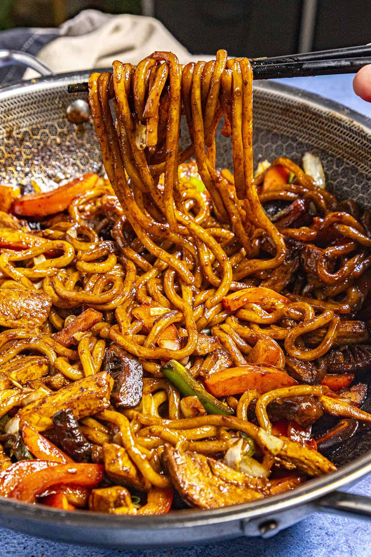 Mike picking up some Yaki Udon noodles from the wok