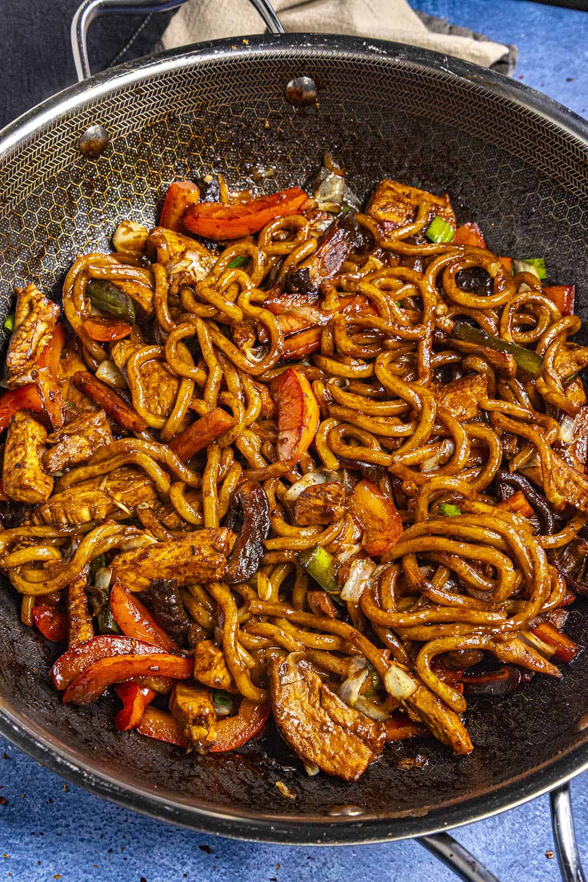Yaki Udon (Japanese Stir Fried Udon Noodles) in a wok, ready to serve