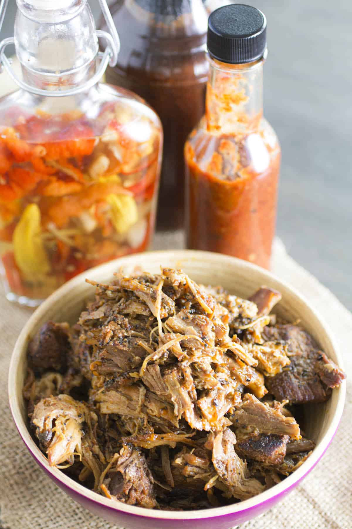 Juicy Pressure Cooker Pulled Pork in a bowl, ready to serve