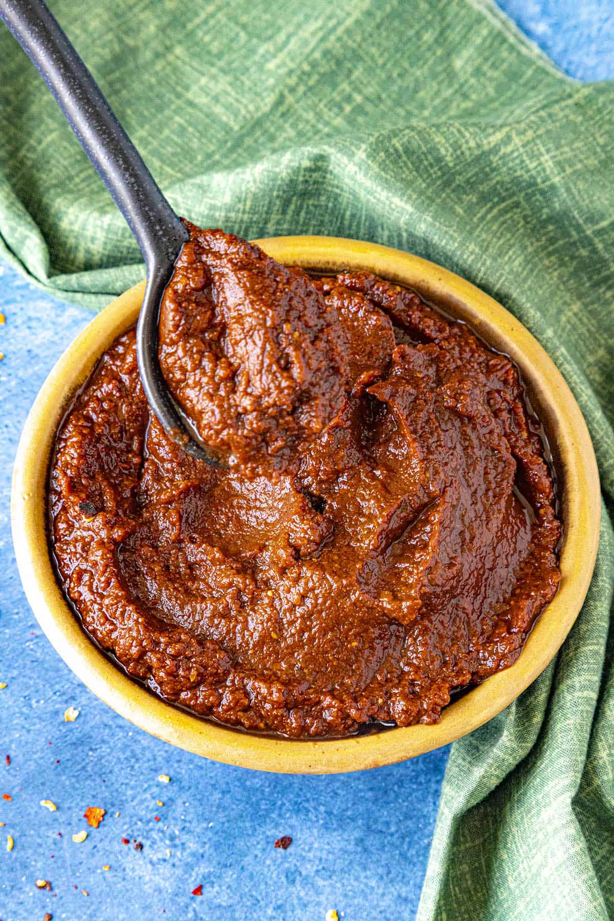 Chicken al Pastor marinade, which is like a thick seasoned chili paste, in a bowl