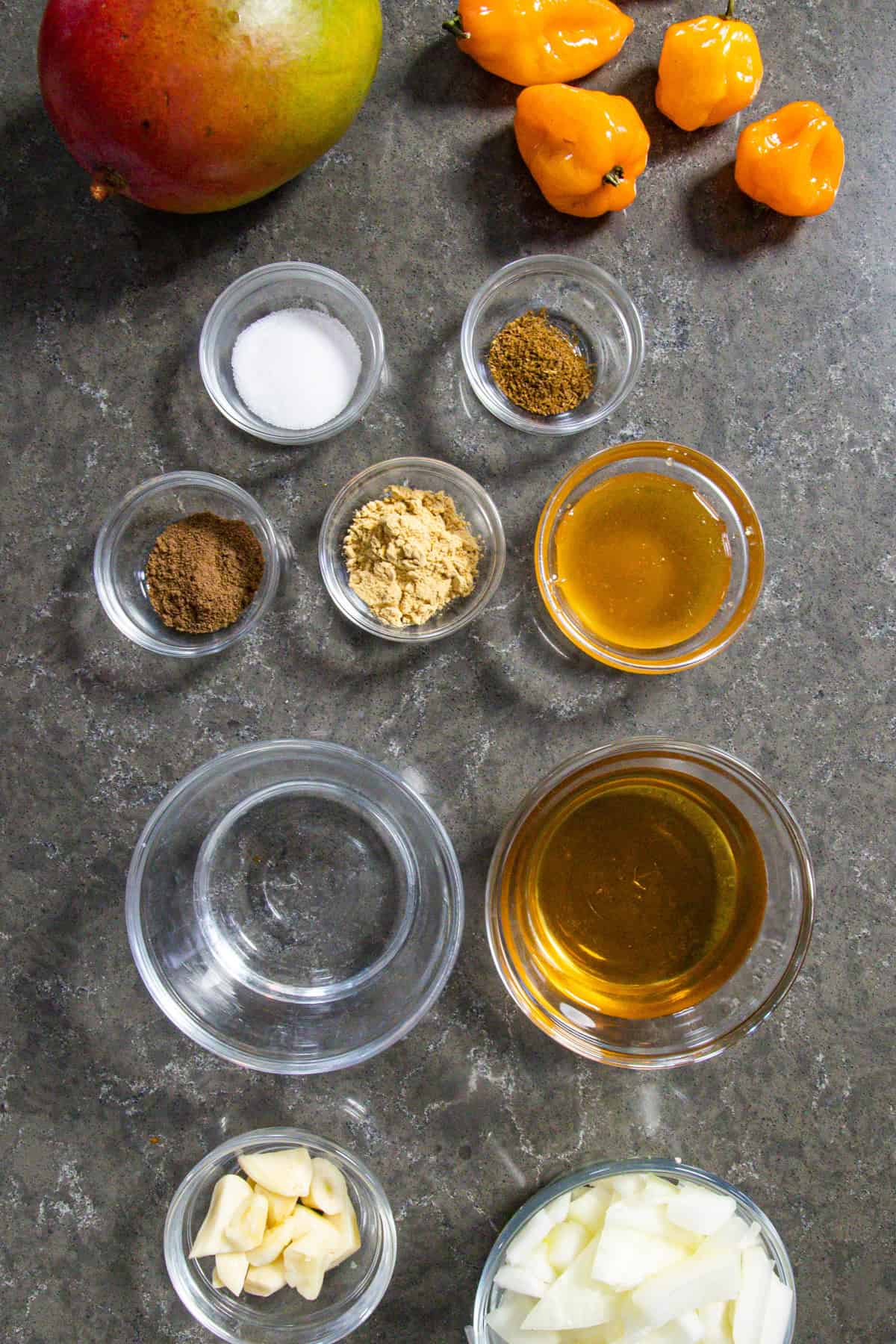 Caribbean-Style Mango-Habanero Hot Sauce Ingredients on a counter