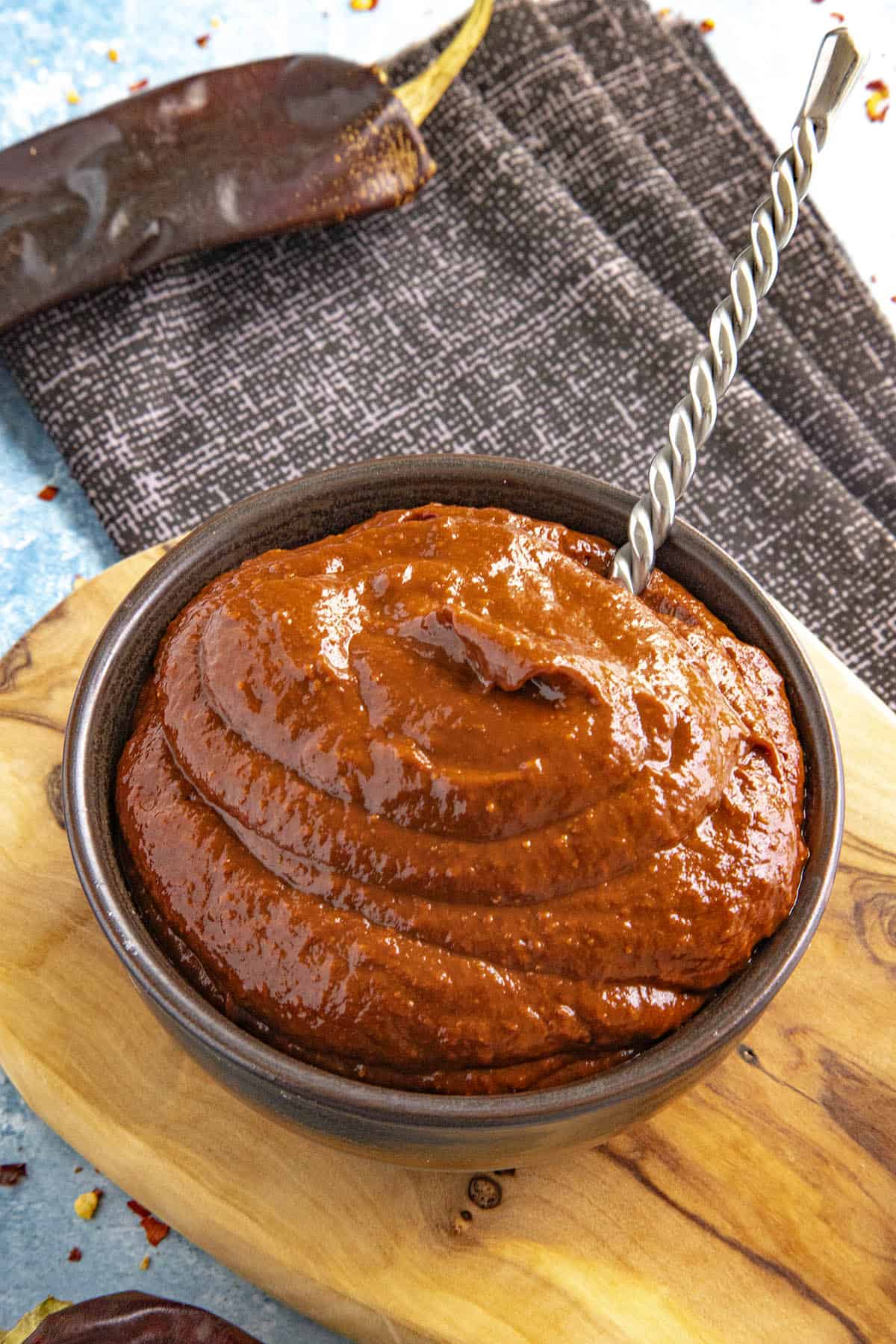 Harissa Paste in a bowl with a spoon
