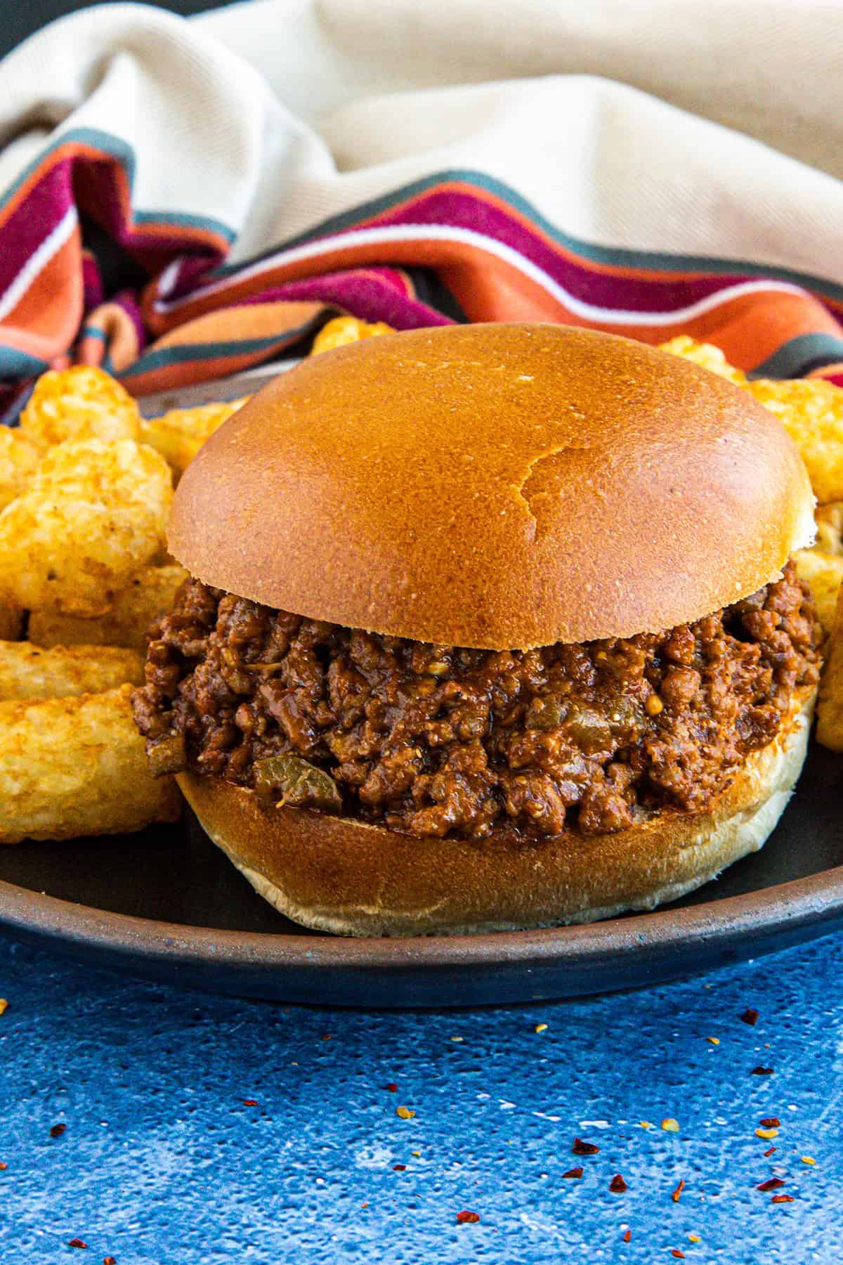 A Homemade Sloppy Joe Recipe with tater tots on a plate