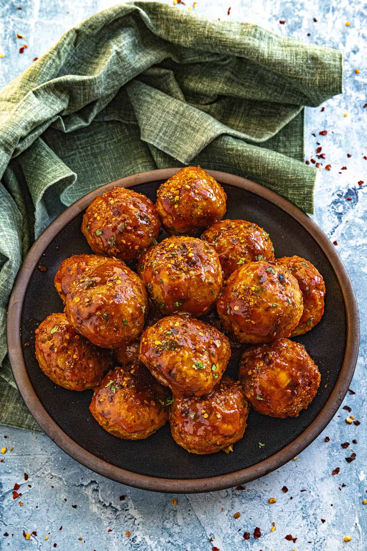 16 honey Sriracha Meatballs on a plate