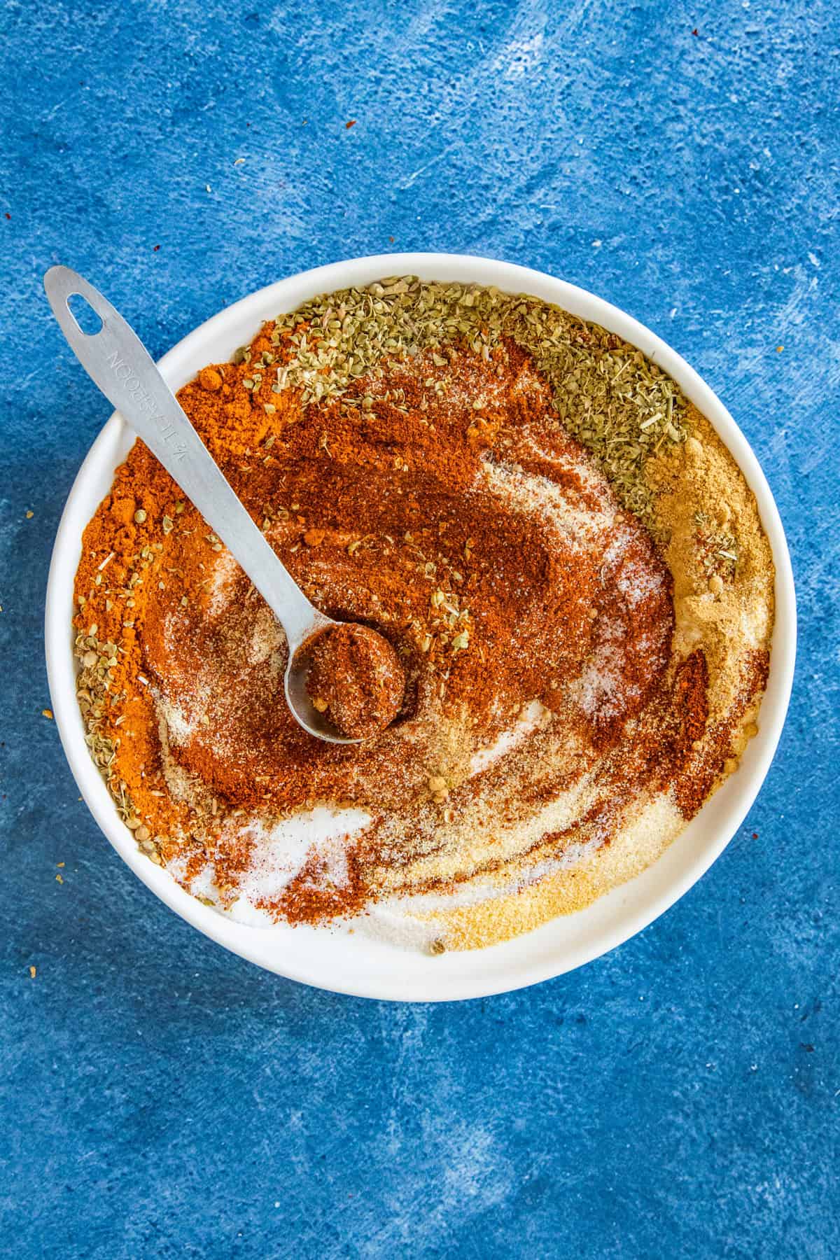 Mixing Peri Peri Seasoning in a bowl