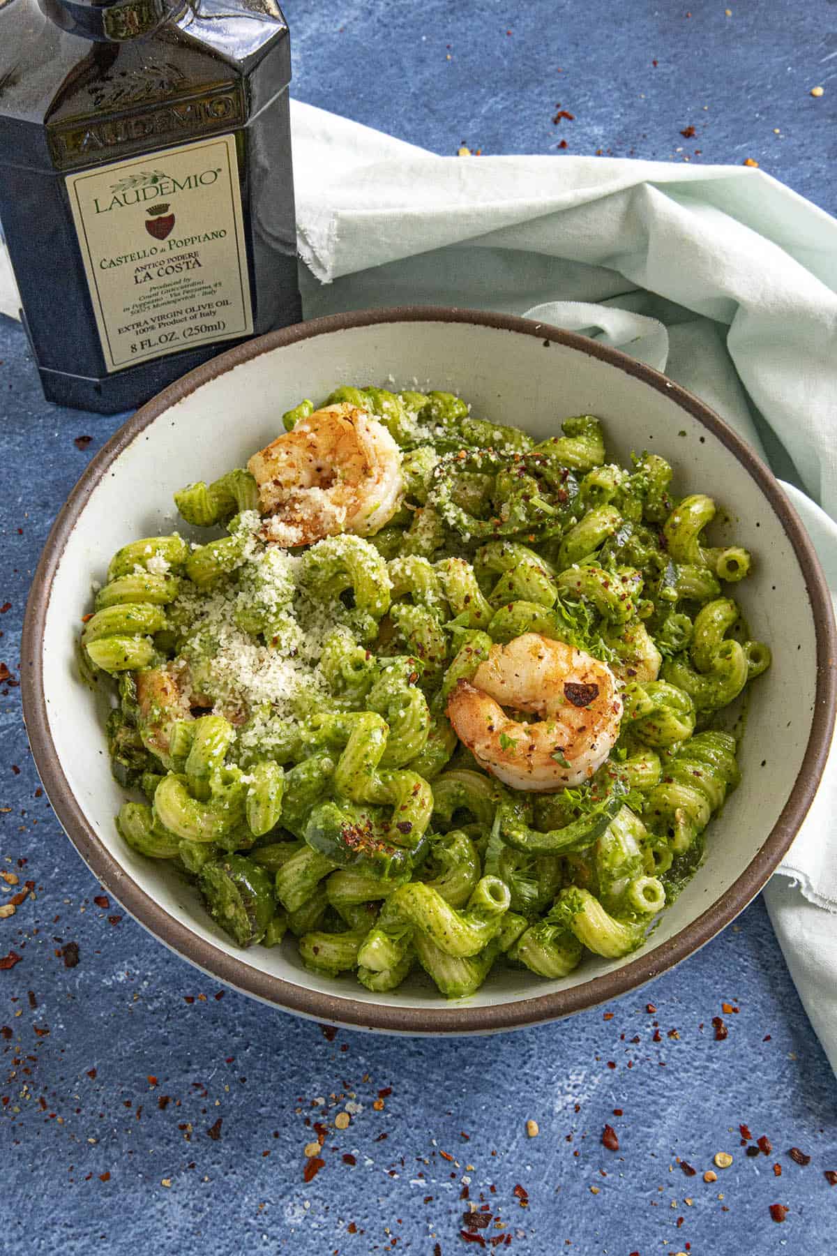 A bowl of pesto pasta made with lots of homemade Italian pesto, served with Tuscan olive oil