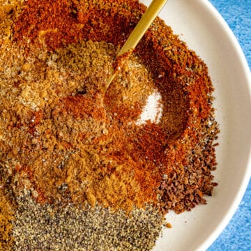 Mixing Baharat Spice Blend ingredients on a plate