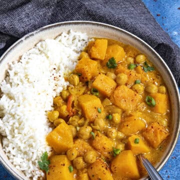 Thai-style Butternut Squash Curry served in a bowl over rice