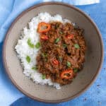 A bowl of Korean Gochujang Ground Beef served over white rice