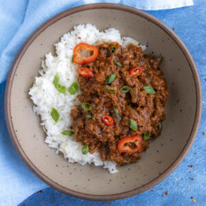 A bowl of Korean Gochujang Ground Beef served over white rice
